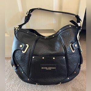 Gianni Versace Couture black leather bag.